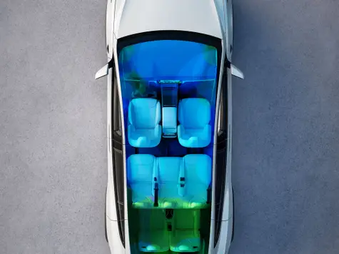 Tesla Model X Elektroauto in der Farbe weiss Ansicht von Oben und Sitze