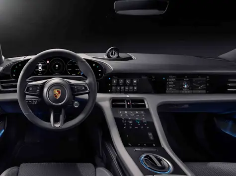 Porsche Taycan Elektroauto in der Farbe blaugrau Ansicht Cockpit Navigation und Display